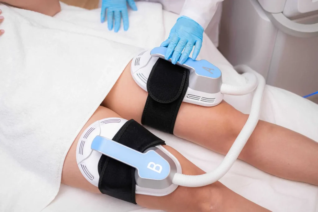 Close-up of EmSculpt Neo applicators targeting thigh muscles for body sculpting treatment in Provo, UT