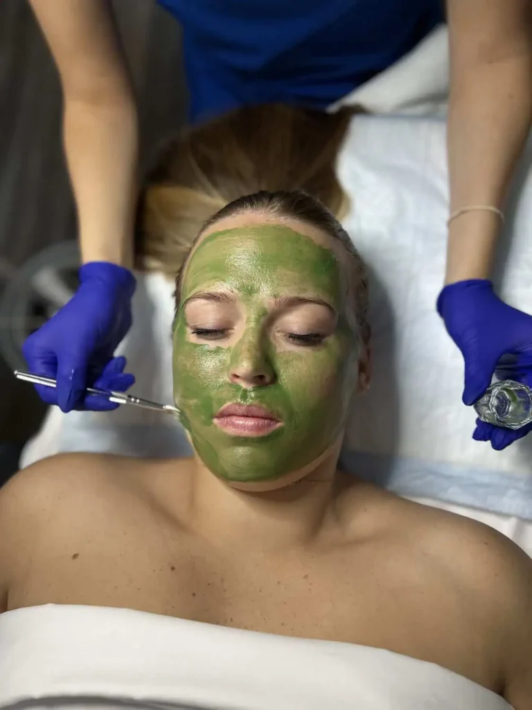 A women receiving a professional facial treatment at a medspa in Provo, Utah