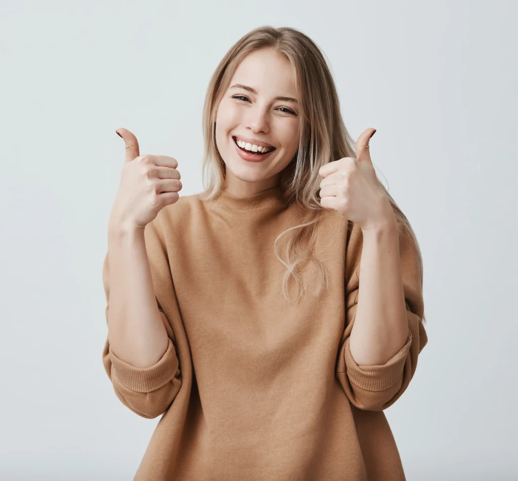 Happy woman giving thumbs up after successful fatigue treatment in Provo UT