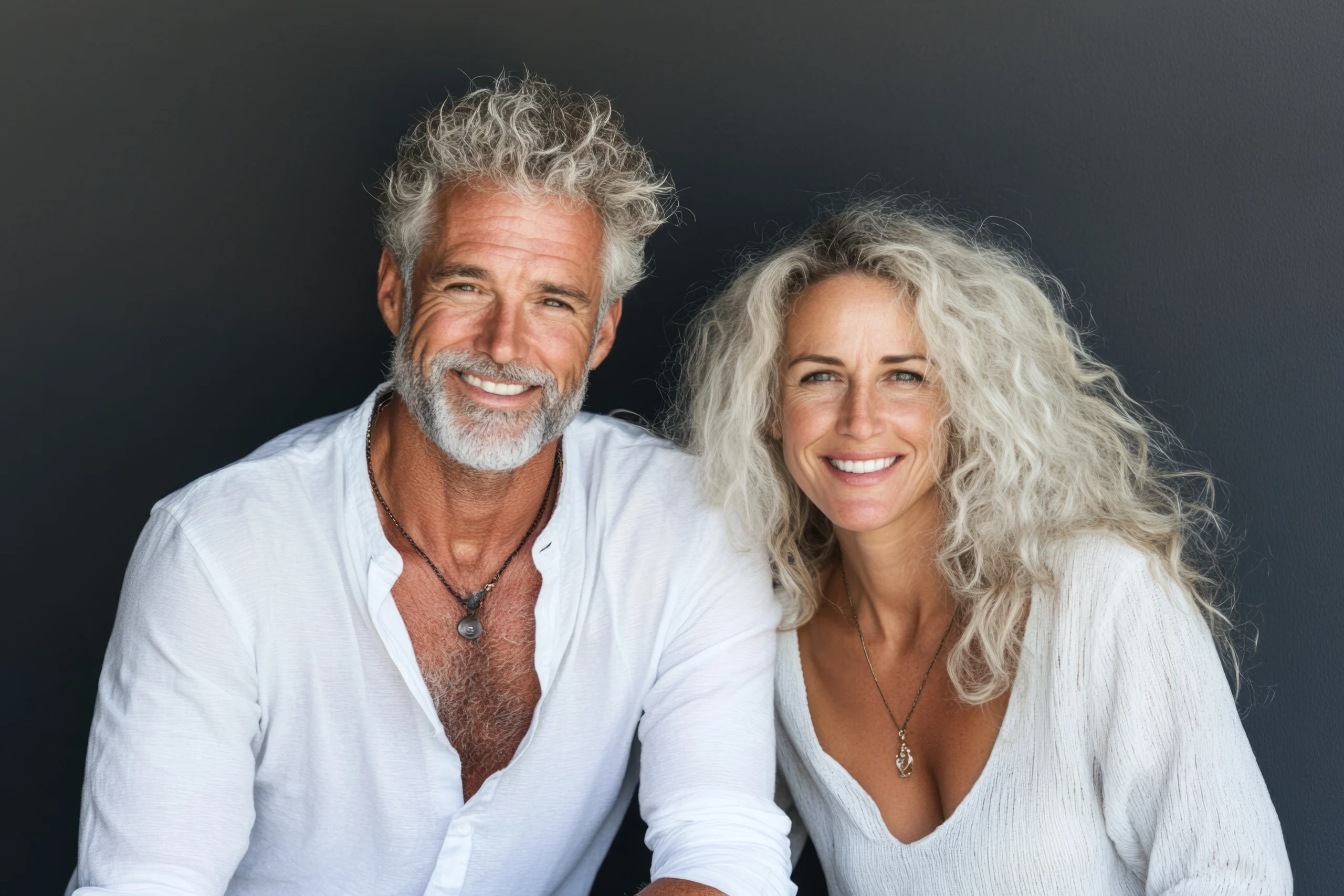 Smiling mature couple representing balanced hormone health and wellness at Optimal Health Family Practice & Medspa