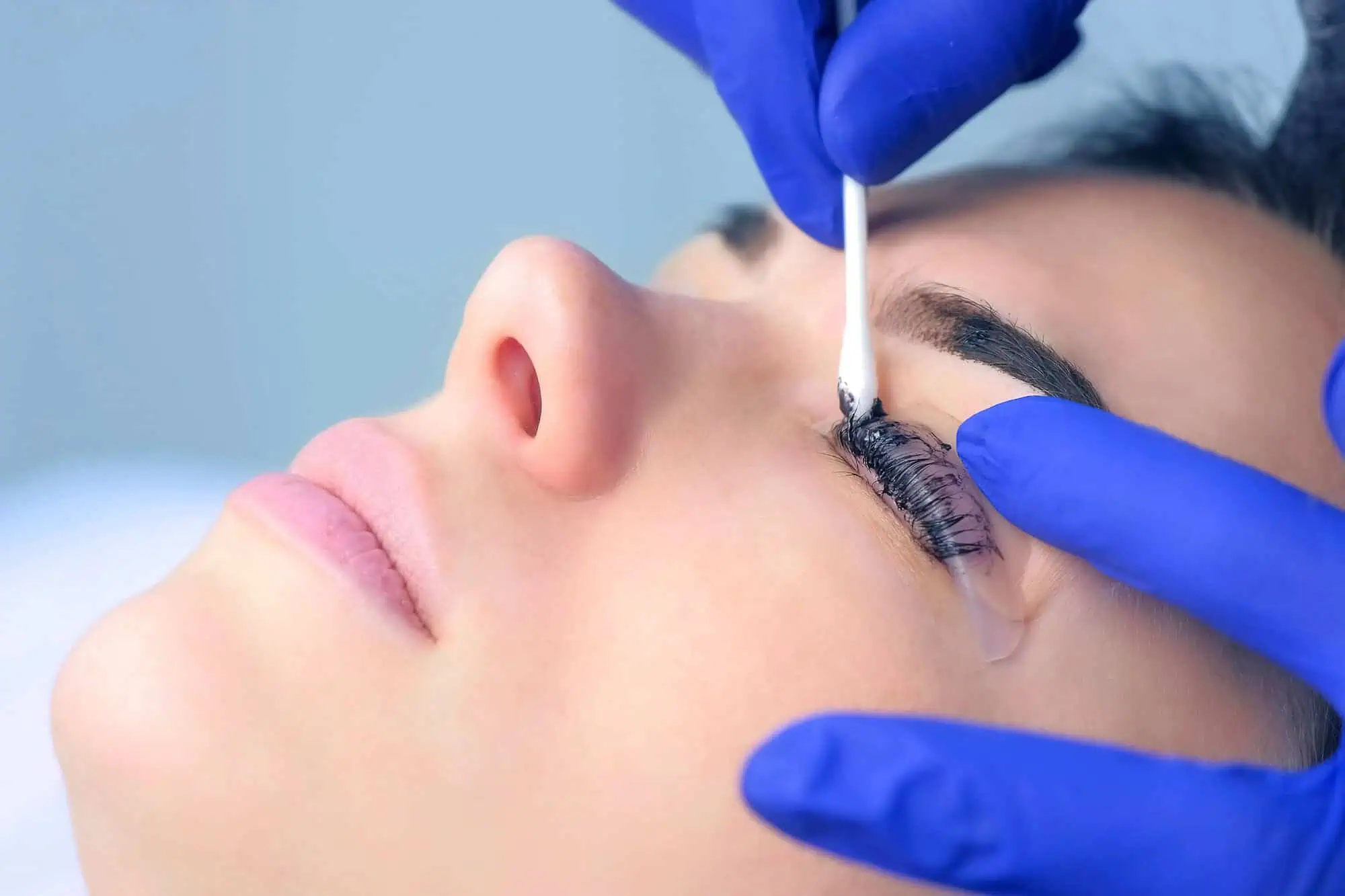 A client having a lash lift and tint