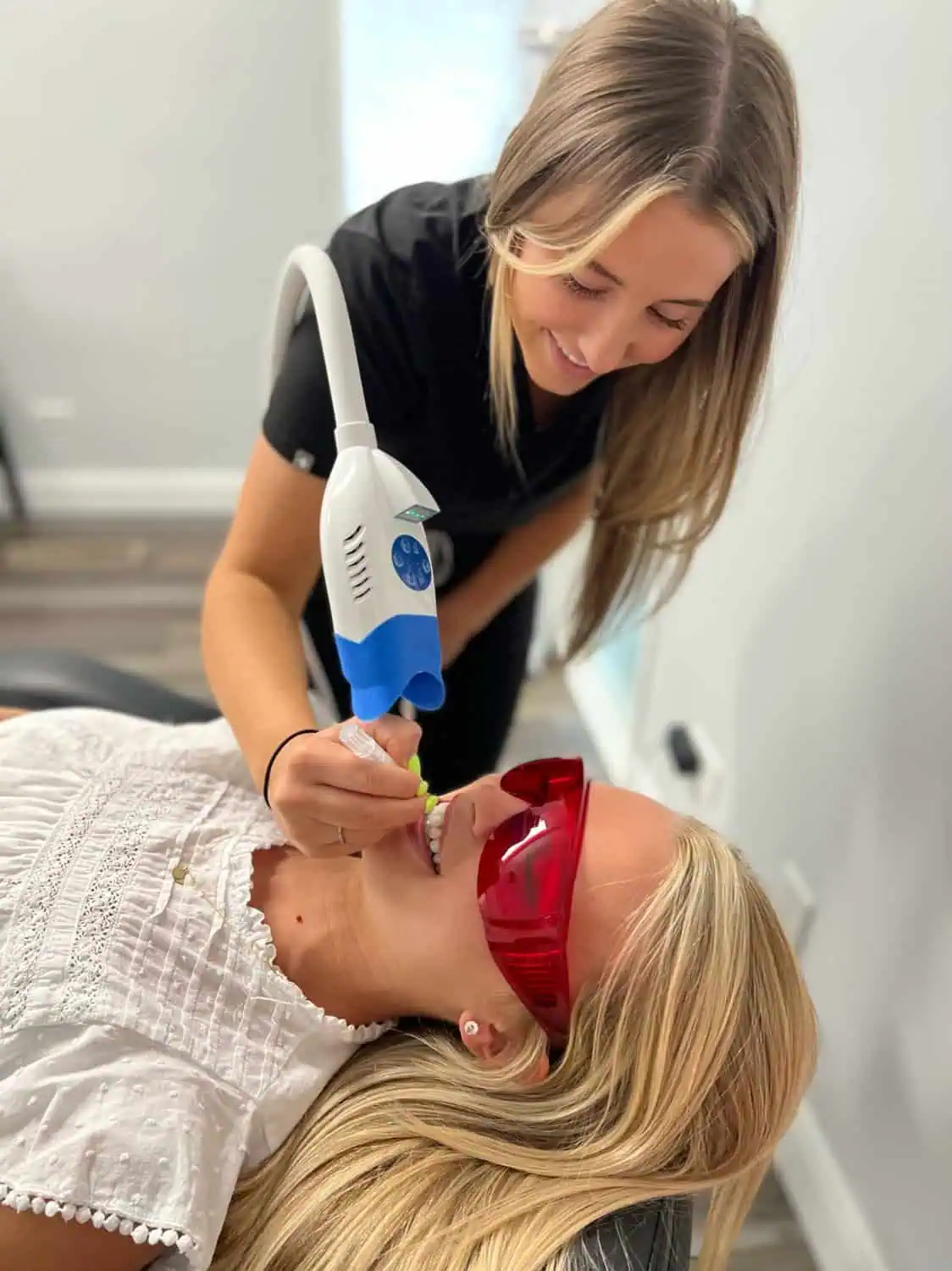 A client having her teeth whitened